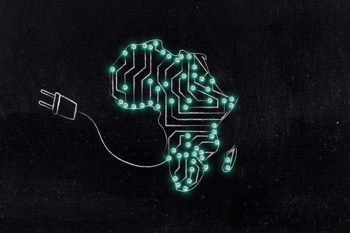 africa map made of electronic microchip circuits & plug