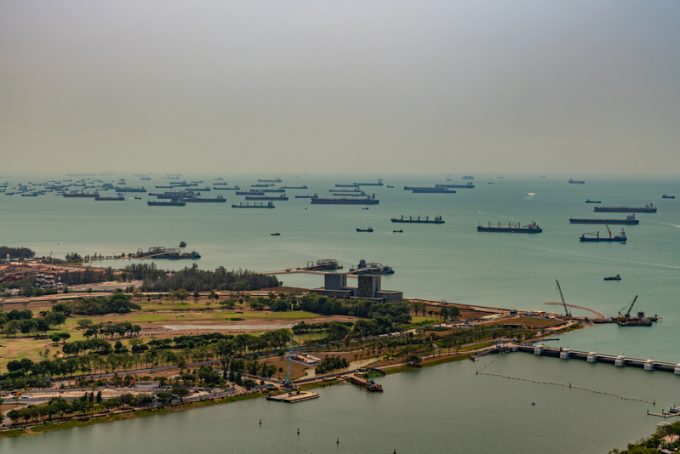 Birds eye, tens of ships anchored in the Strait, Singapore.