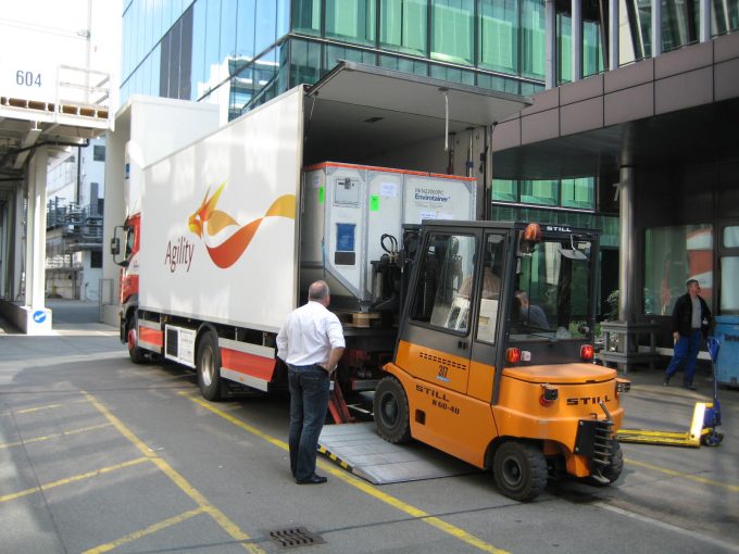 A specialist team moves an Envirotainer at the EuroAirport in Basel, Switzerland, where Agility runs a Pharma Competence Centre