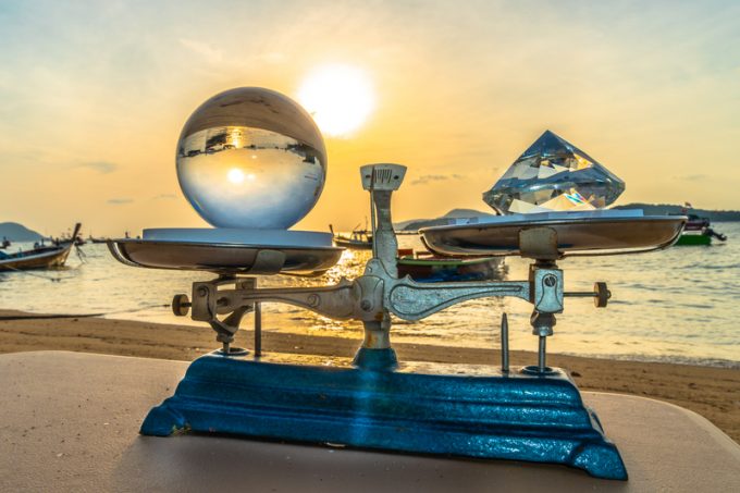 sunrise in clear quartz crystal ball and diamond