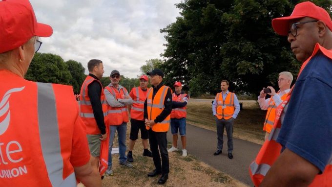 Finance Director Simon Mullett filming strikers on 21 August 2022