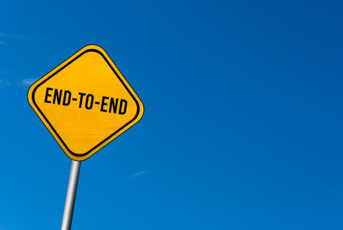 End-to-End - yellow sign with blue sky