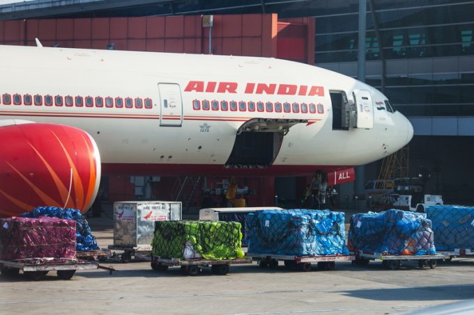 Plane of Air India airline stands on loading at the airport of D