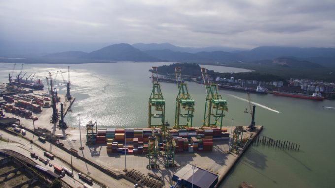 Aerial view Port of Santos - Container ship being loaded at the