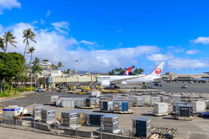 Jet airplanes of Hawaiian Airlines and Japan Airlines at Honolulu International Airport