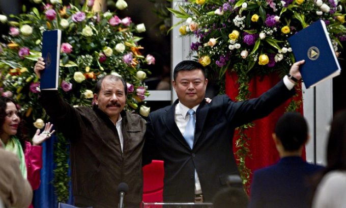 Daniel Ortega and Wang Jing