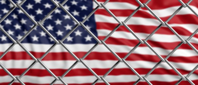 US of America flag behind a steel wire mesh. 3d illustration