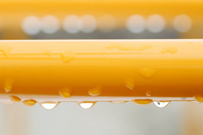 Water drop under bar