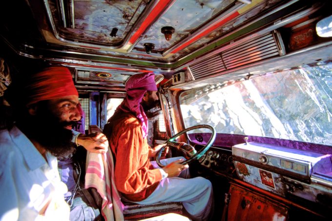Indian Sikh drivers inside a local truck in India