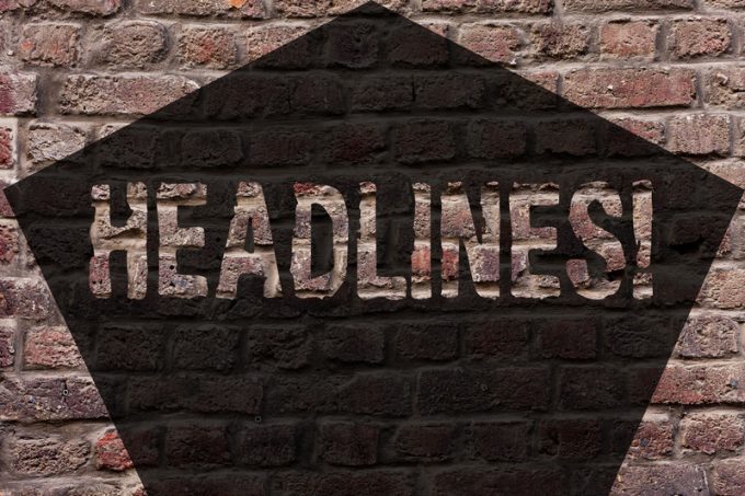 Handwriting text Headlines. Concept meaning Heading at the top of an article in newspaper Brick Wall art like Graffiti motivational call written on the wall.