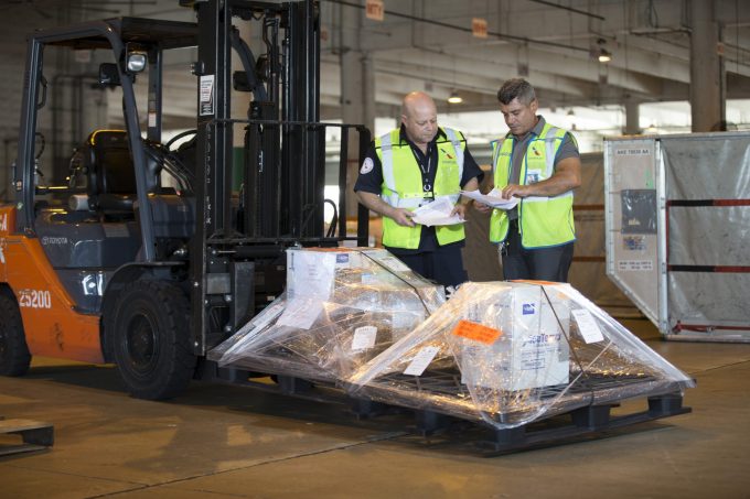 Cargo-Employees-verifying-shipment