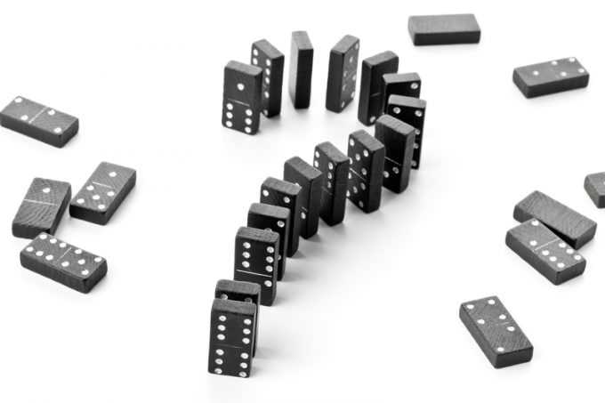 Risk, challenge or uncertainty concept - domino game stones form