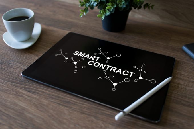 Smart contract blockchain based technology concept on screen. Cryptocurrency, Bitcoin and ethereum.