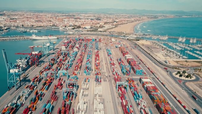VALENCIA, SPAIN - OCTOBER 2, 2018. Aerial view of port container yard and cityscape