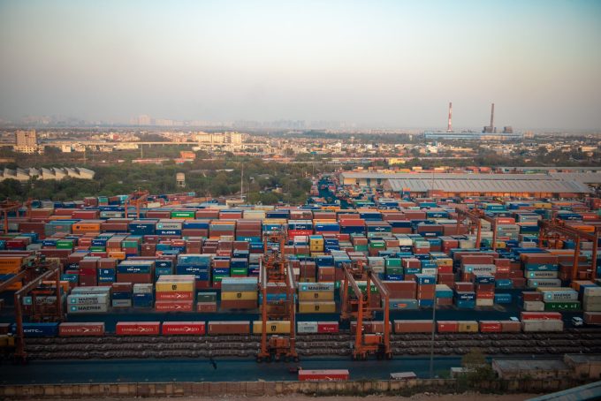 New,Delhi,,India-,23,February,2020:,Crane,Lifting,Up,Container