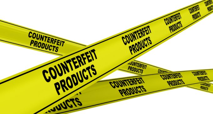 Counterfeit products. Yellow warning tapes