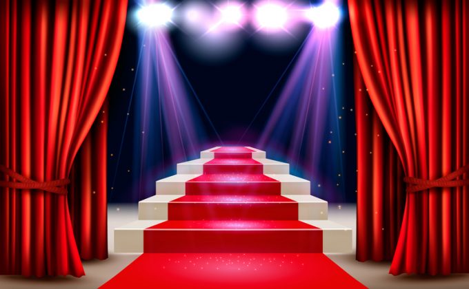 Showroom with red carpet leading to a podium and a spotlight. Festival night show background. Vector.